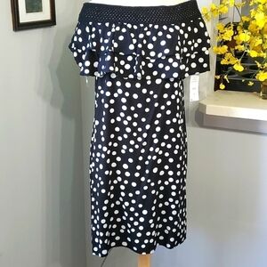 Black and white polka-dot dress by Coco-Bianco, size large. NWT